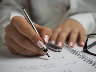 traditional funeral hand writing pen